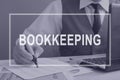 Bookkeeping. Bookkeeper working with financial report.