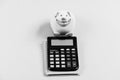 Bookkeeping. financial report. business start up. family budget management. piggy bank with calculator. Moneybox. saving Royalty Free Stock Photo