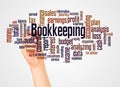 Bookkeeping word cloud and hand with marker concept