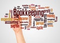 Bookkeeping word cloud and hand with marker concept