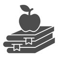 Books and apple solid icon, Education concept, School book and apple sign on white background, stack of books with fruit
