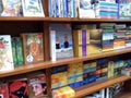 Books arranged in a shelf at book store