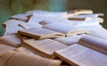 hundreds of open books on an old table Ready for the fall schools Royalty Free Stock Photo
