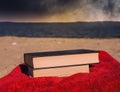 Books on beach with coming storm Royalty Free Stock Photo