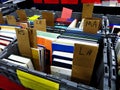 Books in Bins for Book Sale on Shelf Table Royalty Free Stock Photo