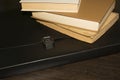 Books and a black folder on the table Royalty Free Stock Photo