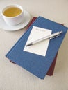 Books, blank booklist and cup of tea Royalty Free Stock Photo