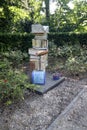 Books with blank pages in honor of cleared graves at a charnel pit in Moerkapelle