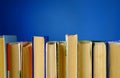 Books on a blue background Royalty Free Stock Photo