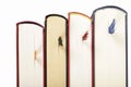 Books with bookmarks standing in row against white background