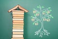 Books building and knowledge tree Royalty Free Stock Photo