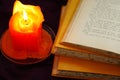 Books with candle Royalty Free Stock Photo