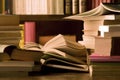 Books on desk and library