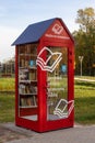 Books exchange point in the Glinianki park near Warsaw, red book swap booth