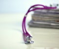 Books folder file and stethoscope isolated on Royalty Free Stock Photo