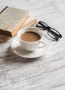 Books, glasses and coffee cup