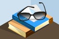 Books, glasses and letter