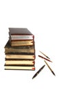 Books with gold and pens Royalty Free Stock Photo