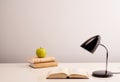 Books and home decorations on desk. Copy space