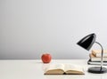 Books and home decorations on desk. Copy space