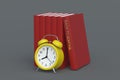 Books with inscription back to school near alarm clock. Education concept Royalty Free Stock Photo