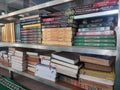 Books and the Koran arranged on the Mosque Shelf, Jakarta 29 August 2023