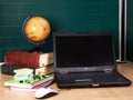 Books and laptop. School supplies. Royalty Free Stock Photo