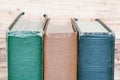 Books next to the wooden wall Royalty Free Stock Photo