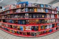 books and novels displayed on shelves of large Italian supermarket Royalty Free Stock Photo