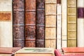 Books in a row. Old manuscripts. Antique library books. Royalty Free Stock Photo