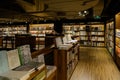 Books on shelves in corner of bookstore