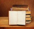 Books stack and opened book Royalty Free Stock Photo