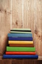 Books on the wooden shelf Royalty Free Stock Photo