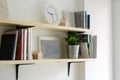 Books on a wooden shelf