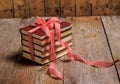 Books wrapped with color ribbon, on wooden table