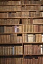 Bookshelf with antique old books in a museum Royalty Free Stock Photo