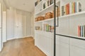 a bookshelf in a home library with books