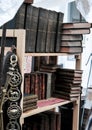 Bookshelf with old books in a stall in Portobello Road