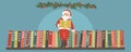 Santa Claus reading book on bookshelf