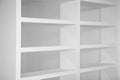 Bookshelf in white empty blank shelfs Royalty Free Stock Photo