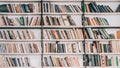 Bookshelves with books in library, book store, at home. Abstract blurred background. School, back to school, education Royalty Free Stock Photo