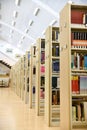 Bookshelves in the public library. Vertical version