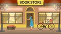 Bookshop, bookstore building facade with girl. A lot of books on the shelves. Beautiful bicycle near the building. Royalty Free Stock Photo