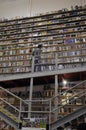 Bookstore - Young Man Looking at Books on Shelves