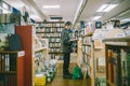 Bookstore concept, man reading book in bookstores Royalty Free Stock Photo