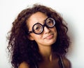 Bookworm, cute young woman in glasses, curly hair, teenage Royalty Free Stock Photo