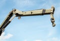 Boom and hook of a construction crane on the truck Royalty Free Stock Photo