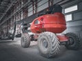 Boom lift picker inside industrial building Royalty Free Stock Photo