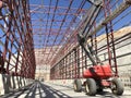 Boom lift picker inside industrial building Royalty Free Stock Photo