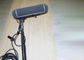 Boom microphones lay down on wood table after using Royalty Free Stock Photo